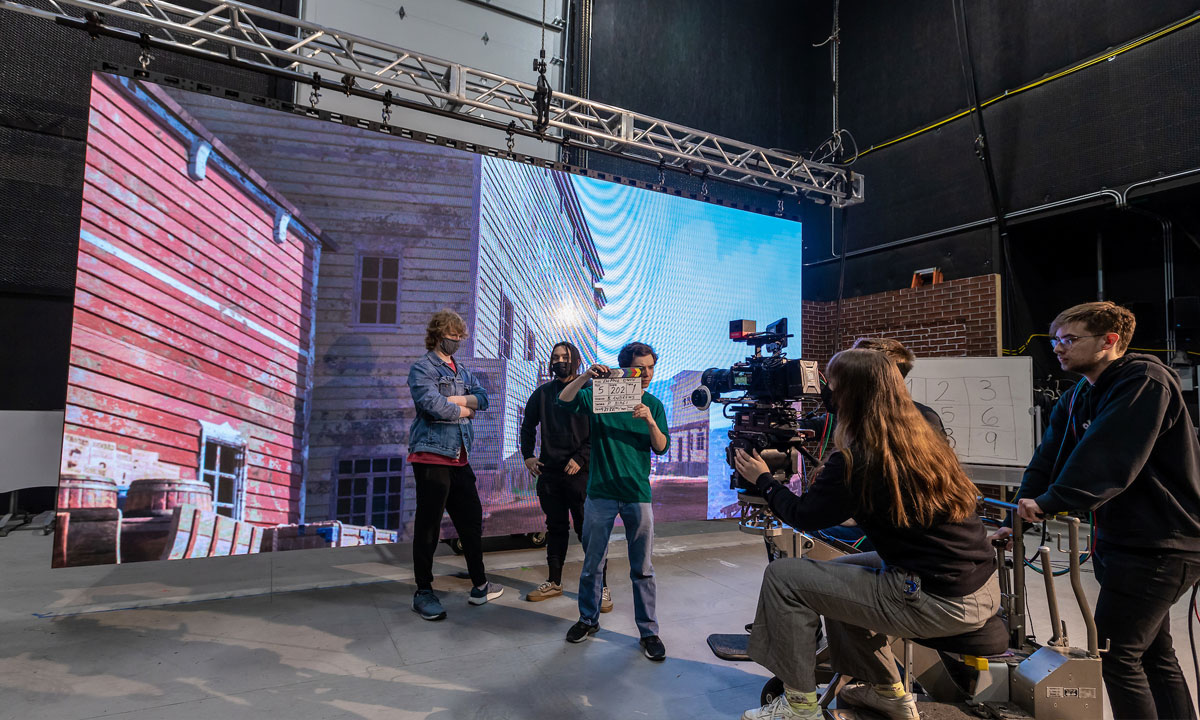 students filming on set