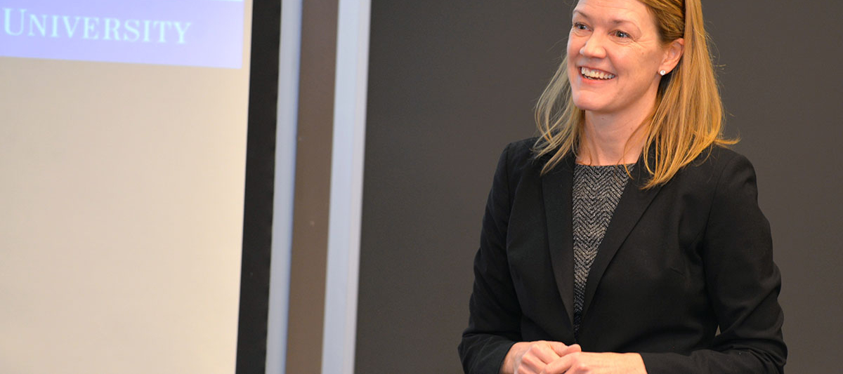 Faculty member teaching in a classroom