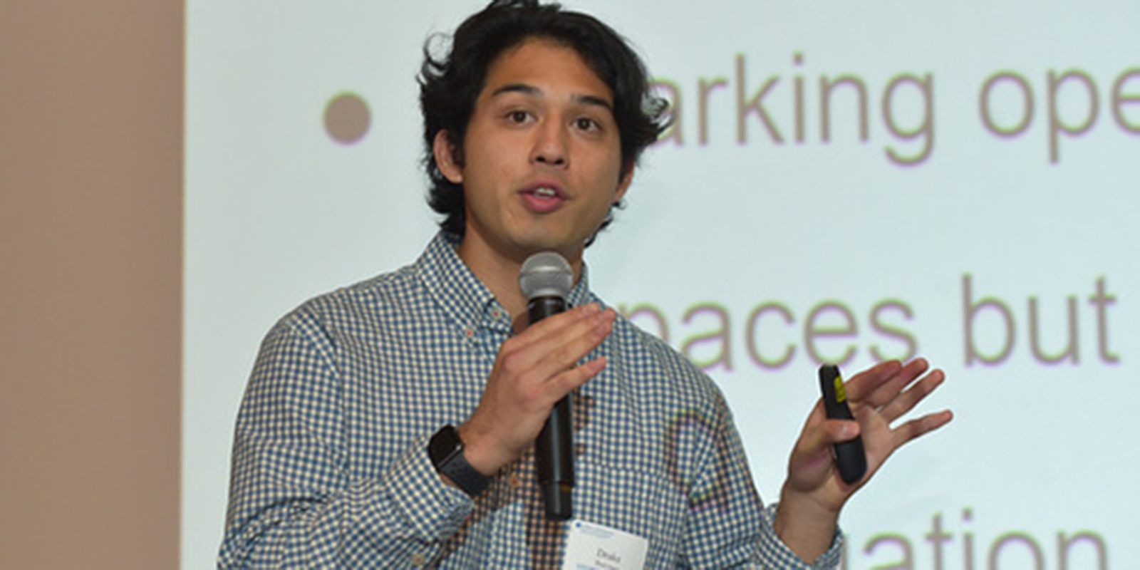 A student presents at business competition last summer.