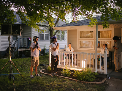 Student crew shooting outdoors