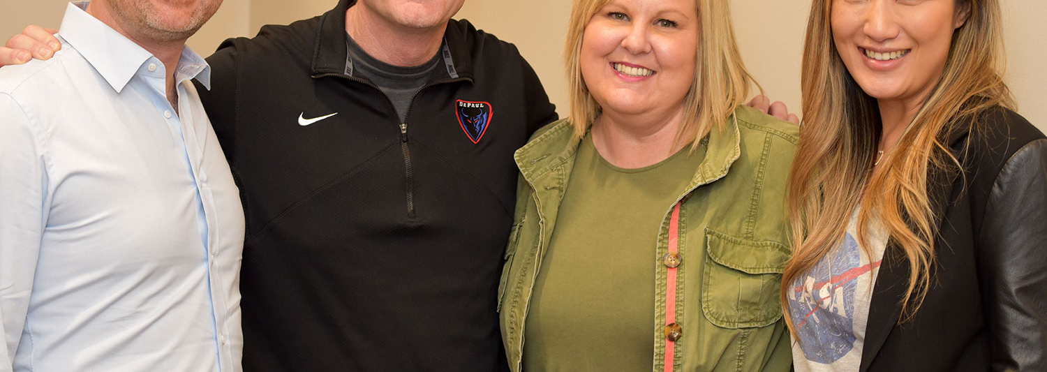 Woman speaking in front of class