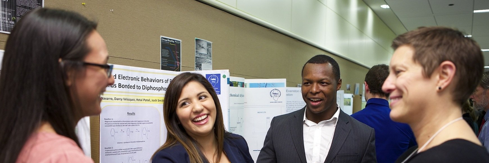 group of people talking at an event