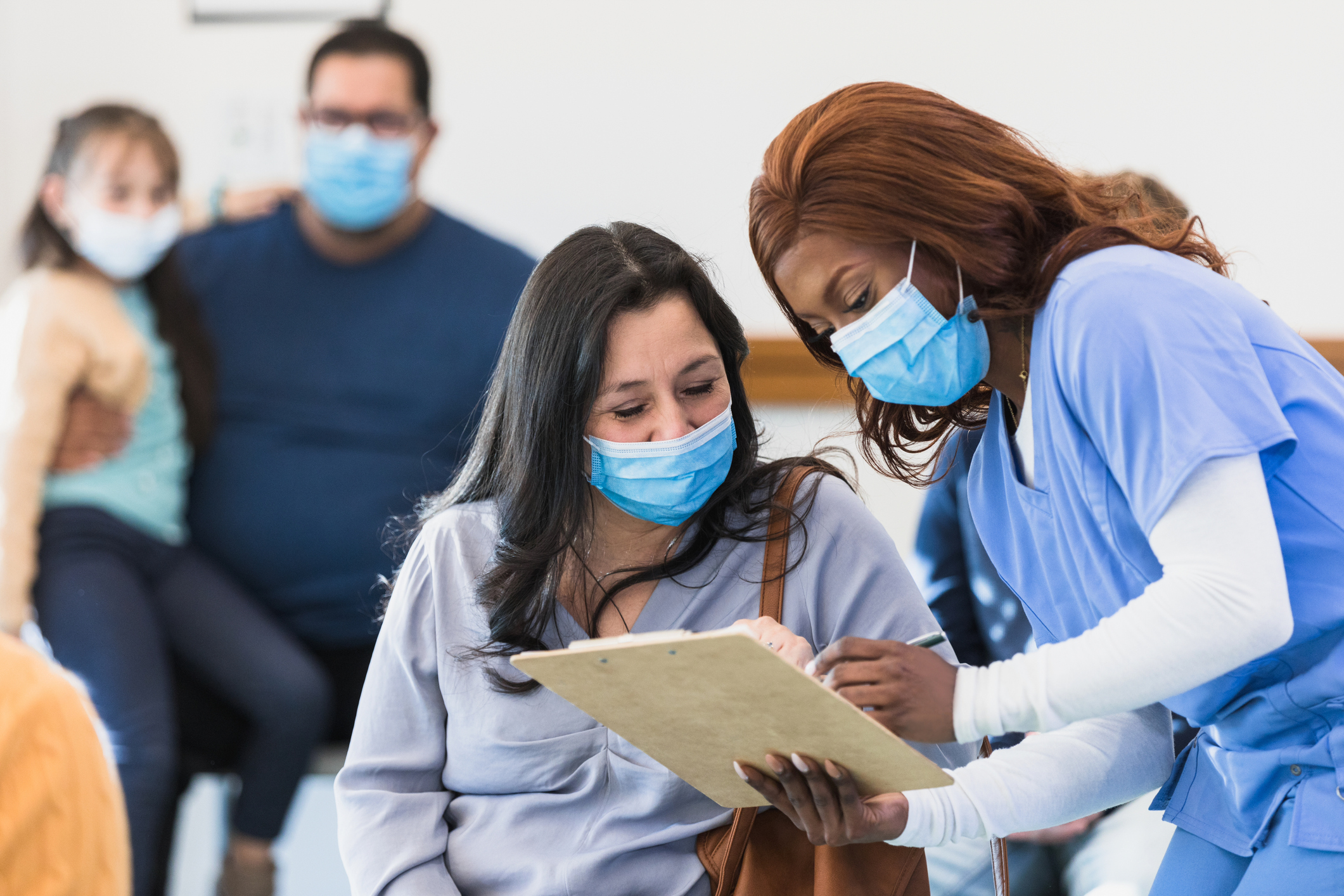 nurse talking to a patient