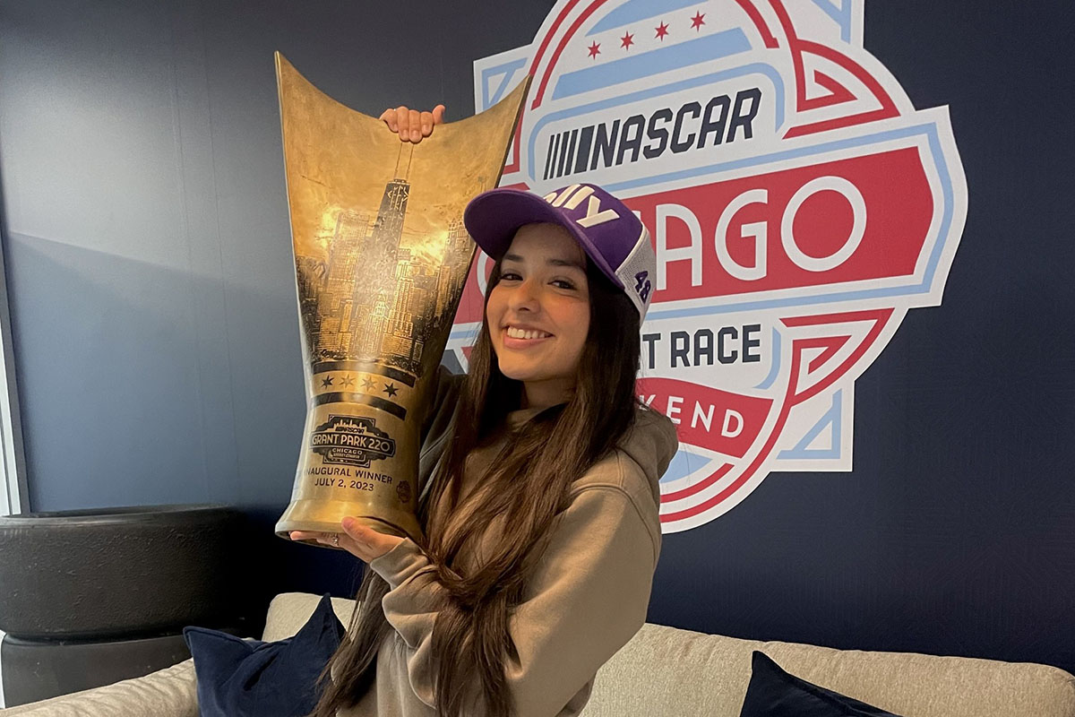 Angela Hernandez with NASCAR trophy