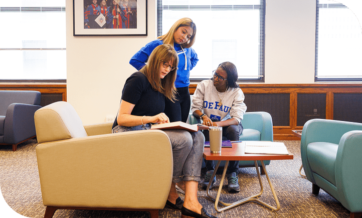 Three female DePaul Law Students in lounge