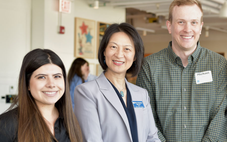 Group of students with the Dean of the the College of Business