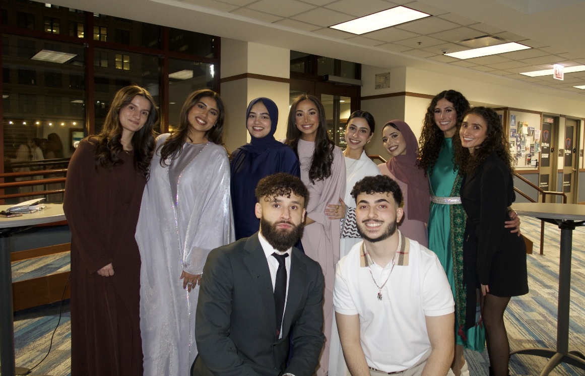 Smiling Law Student, Amna, standing with MLSA