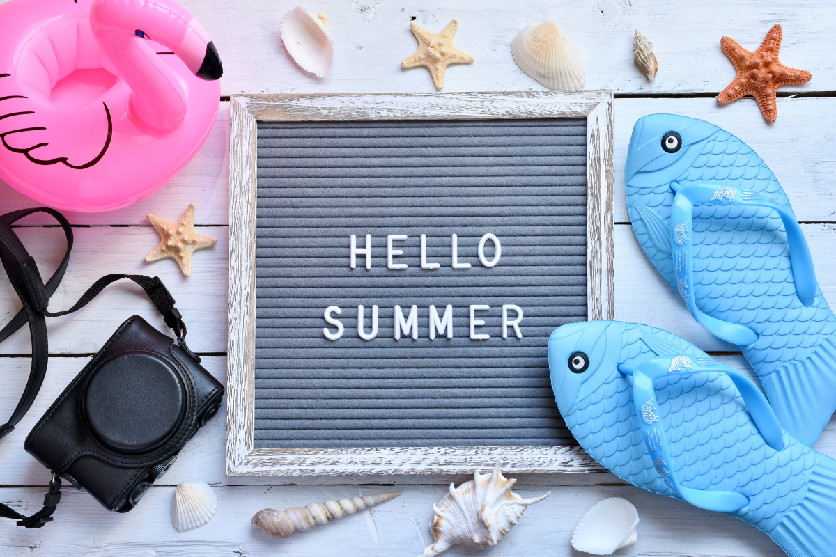 A sign says Hello Summer