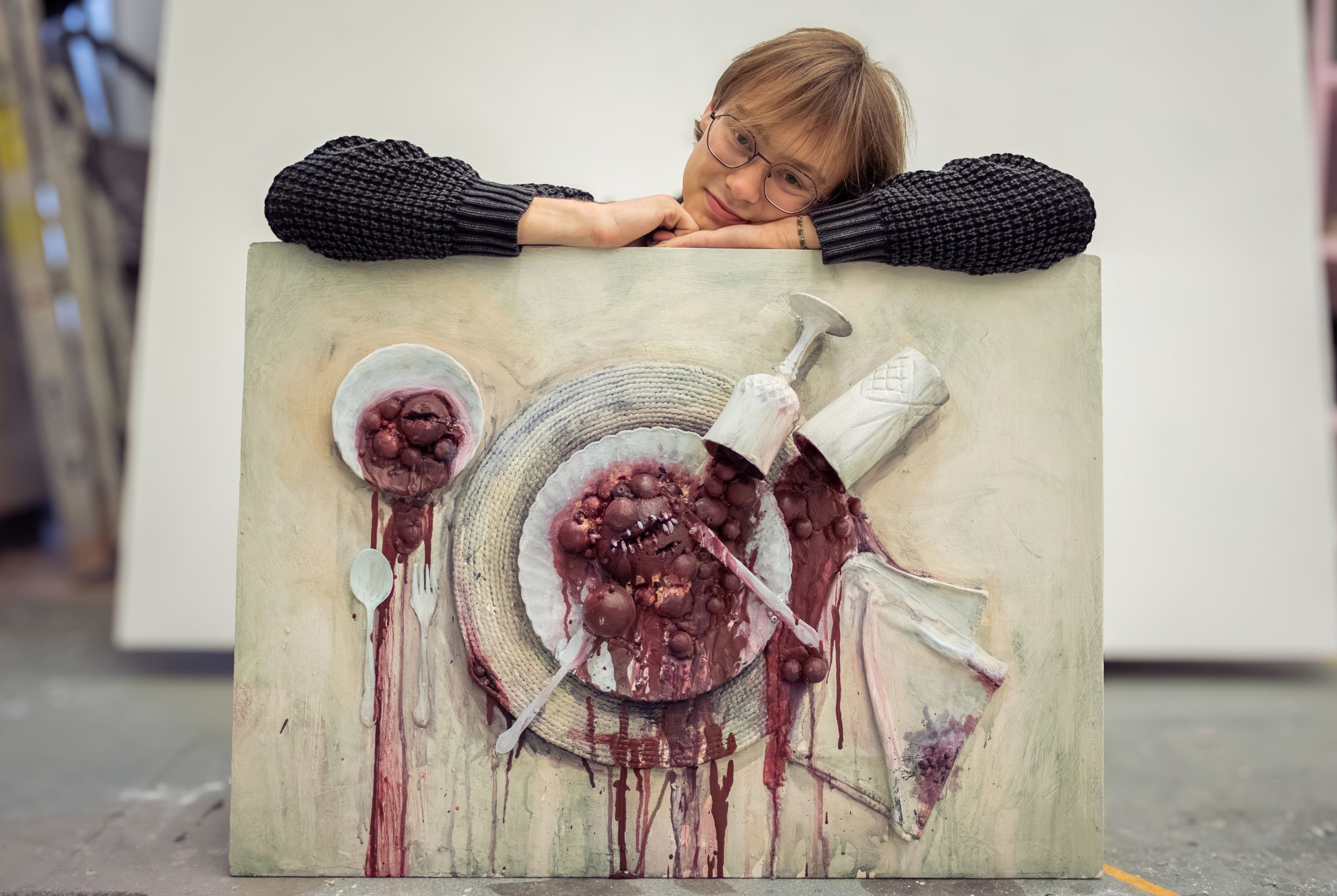 Izaak Kary and a sample from his portfolio
