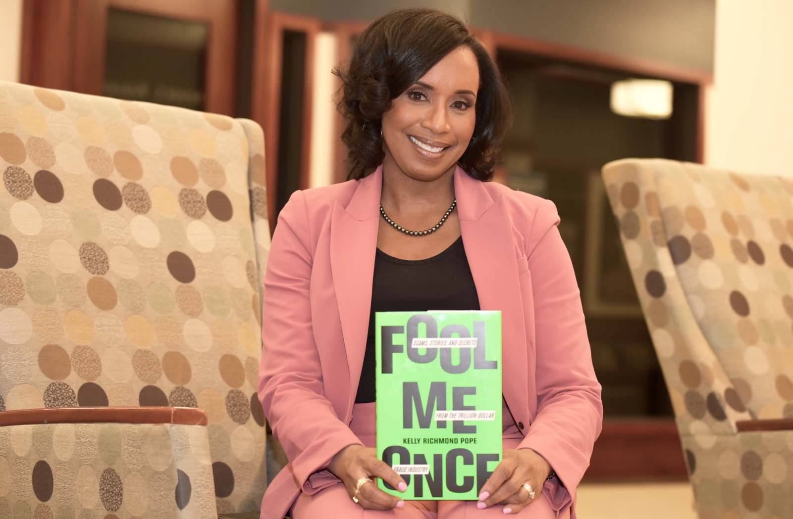 Accountancy Professor and author Kelly Richmond Pope with her book, 