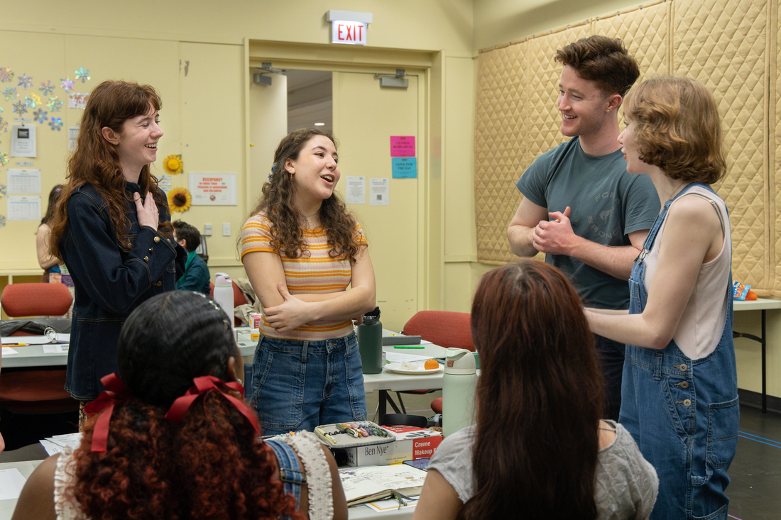 Students collaborating at The Theatre School
