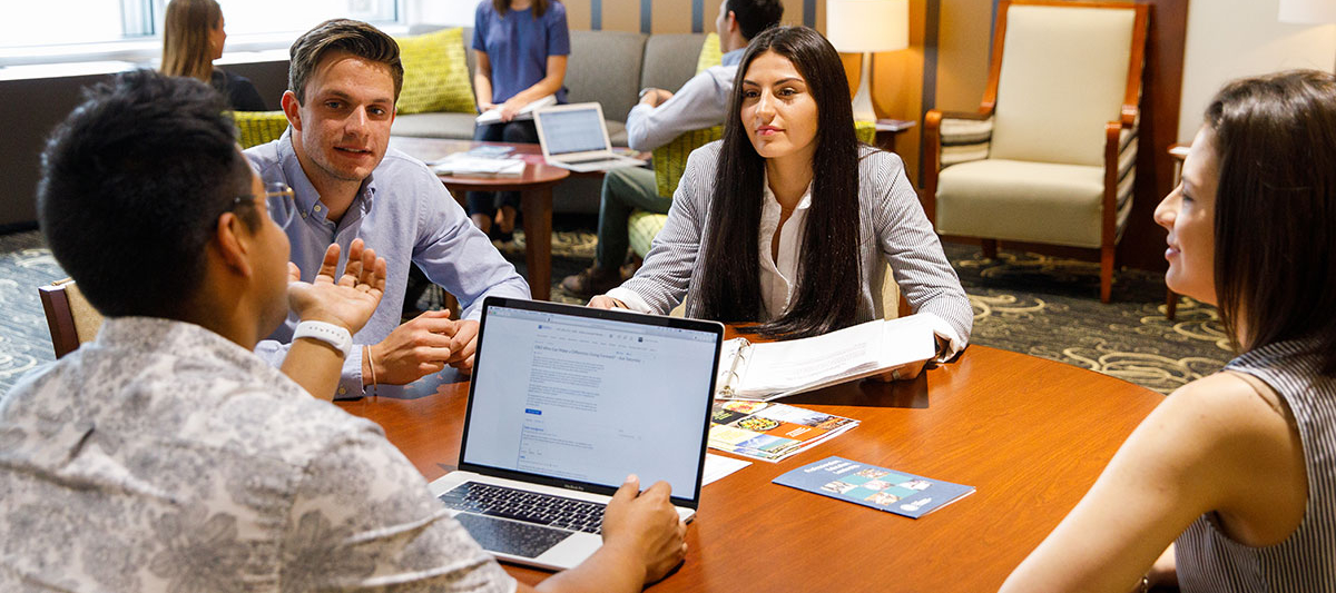 Students talking to each other in a classroom