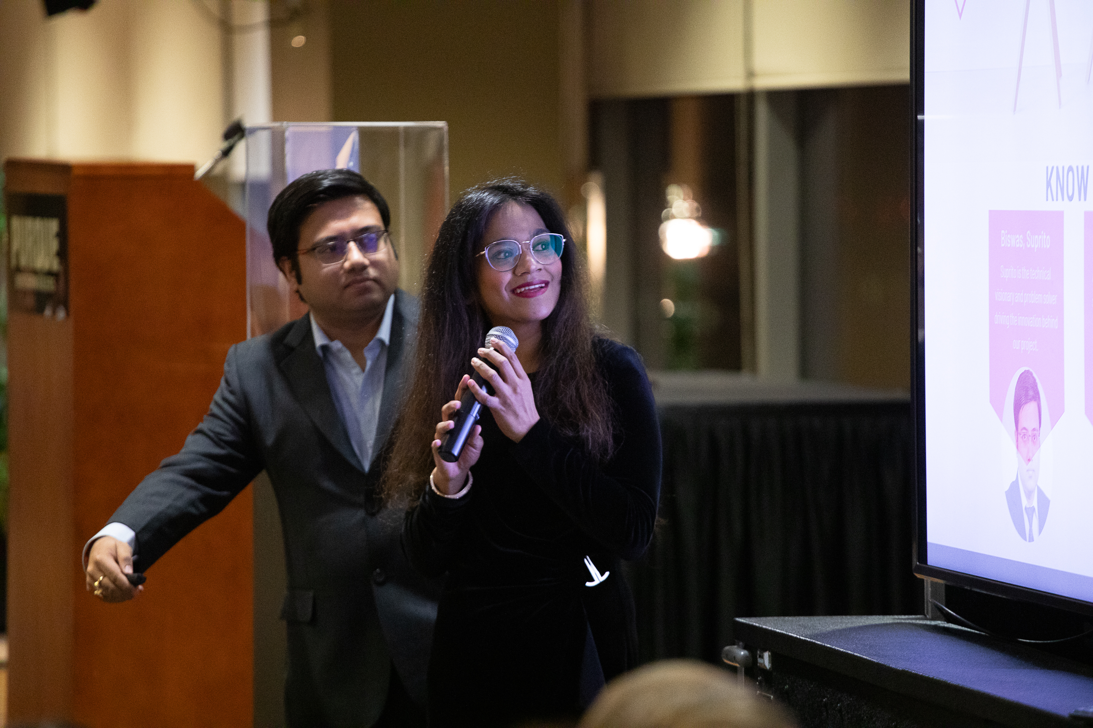 Syeda and Biswas in the middle of their presentation