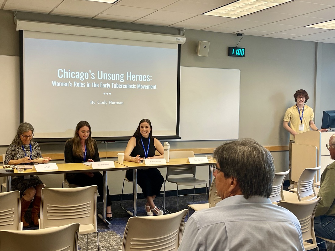 students presenting at Student History Conference