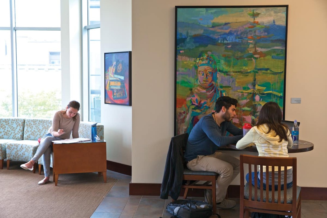 students talking in common seating area