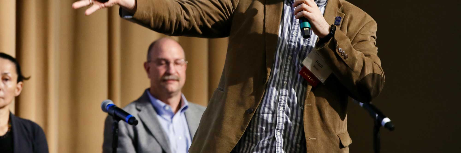 Professor Paul Booth presenting to an audience