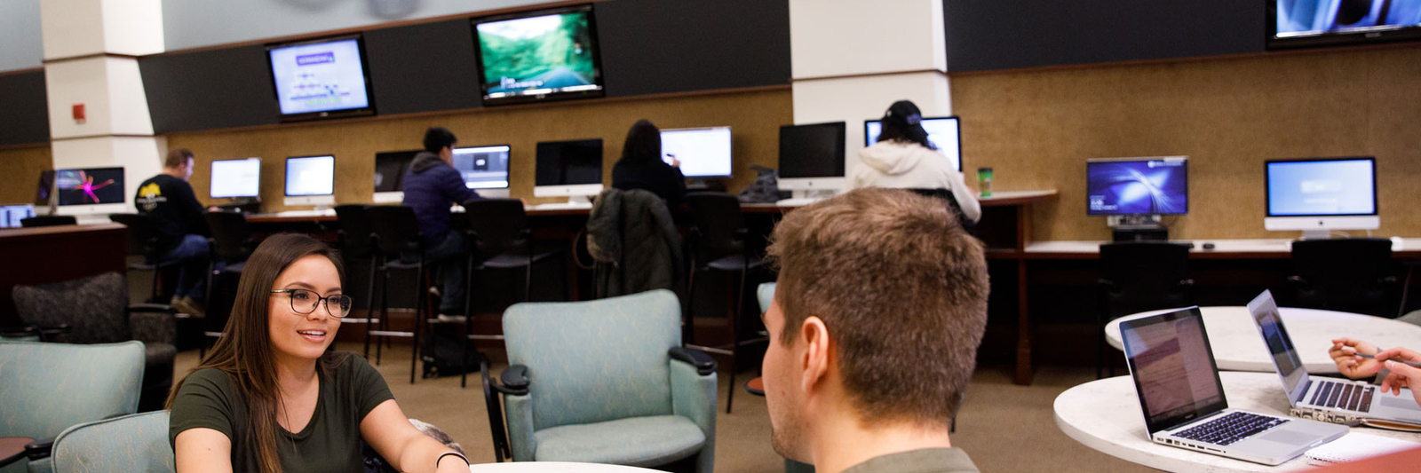 Students talking in a study lounge