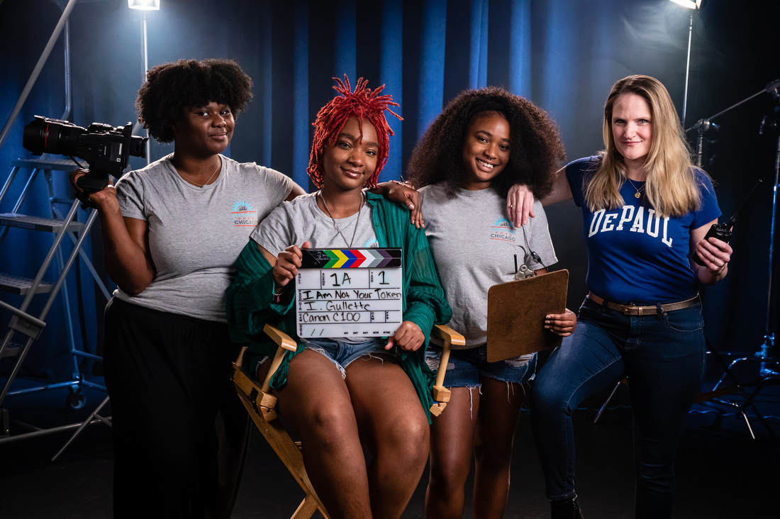 CHA DePaul filmmakers pose on set