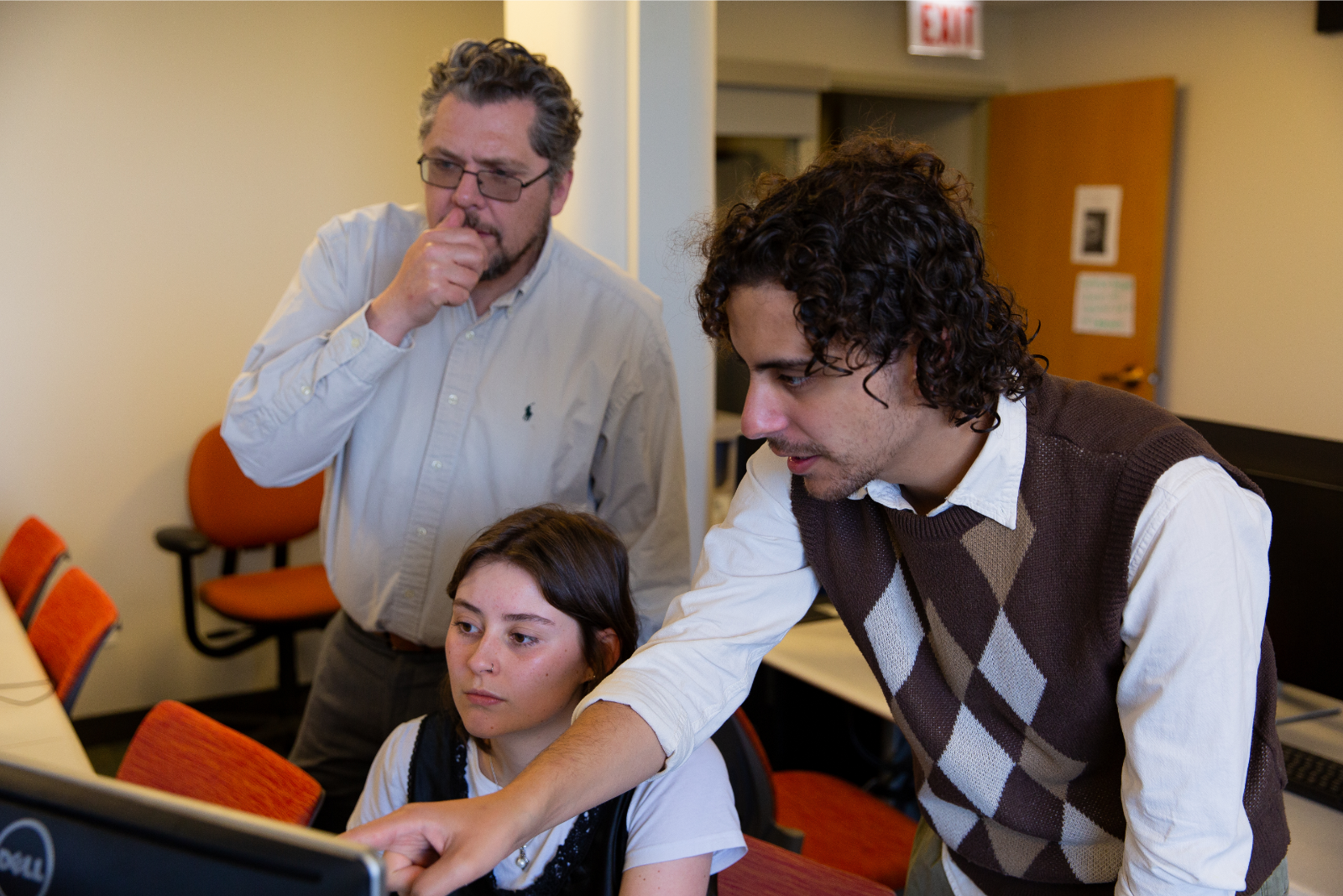Professor Euan Hague with Student Urban Research Corps members Chris Impellizeri and Lacy Wright