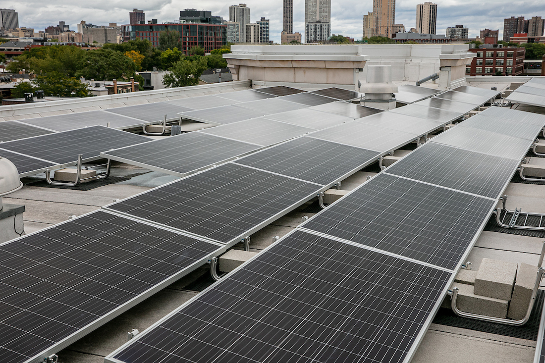Solar panels on the roof of Clifton-Fullerton residence hall