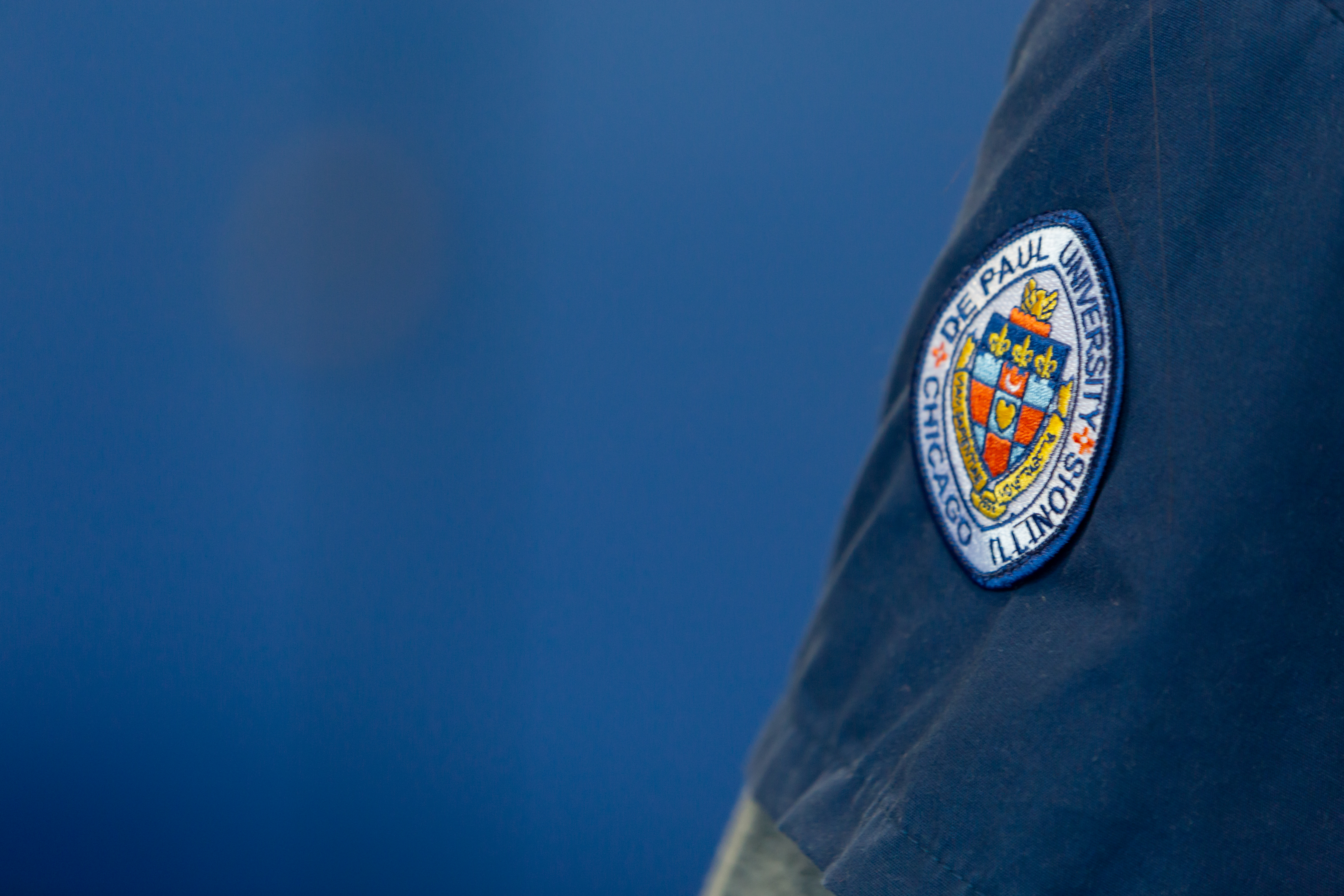 DePaul crest on nursing scrubs
