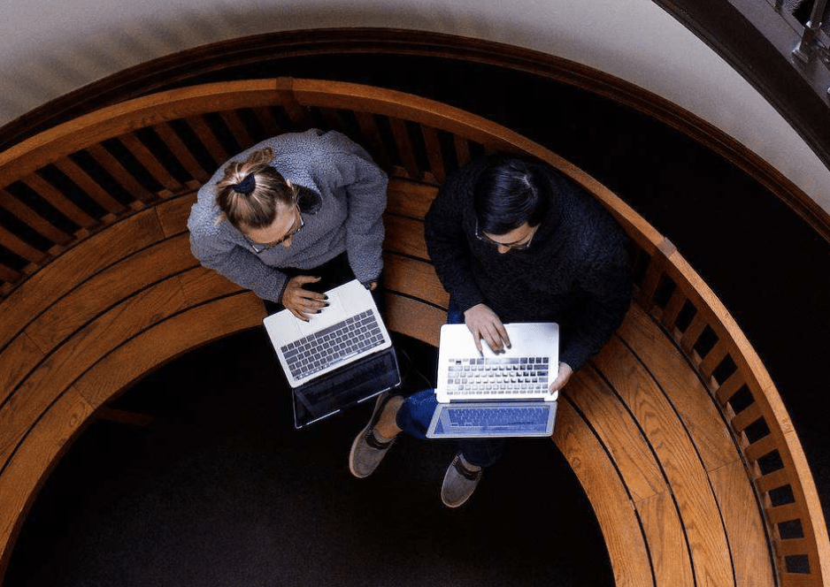 Law Library Stairway with Students On Laptops
