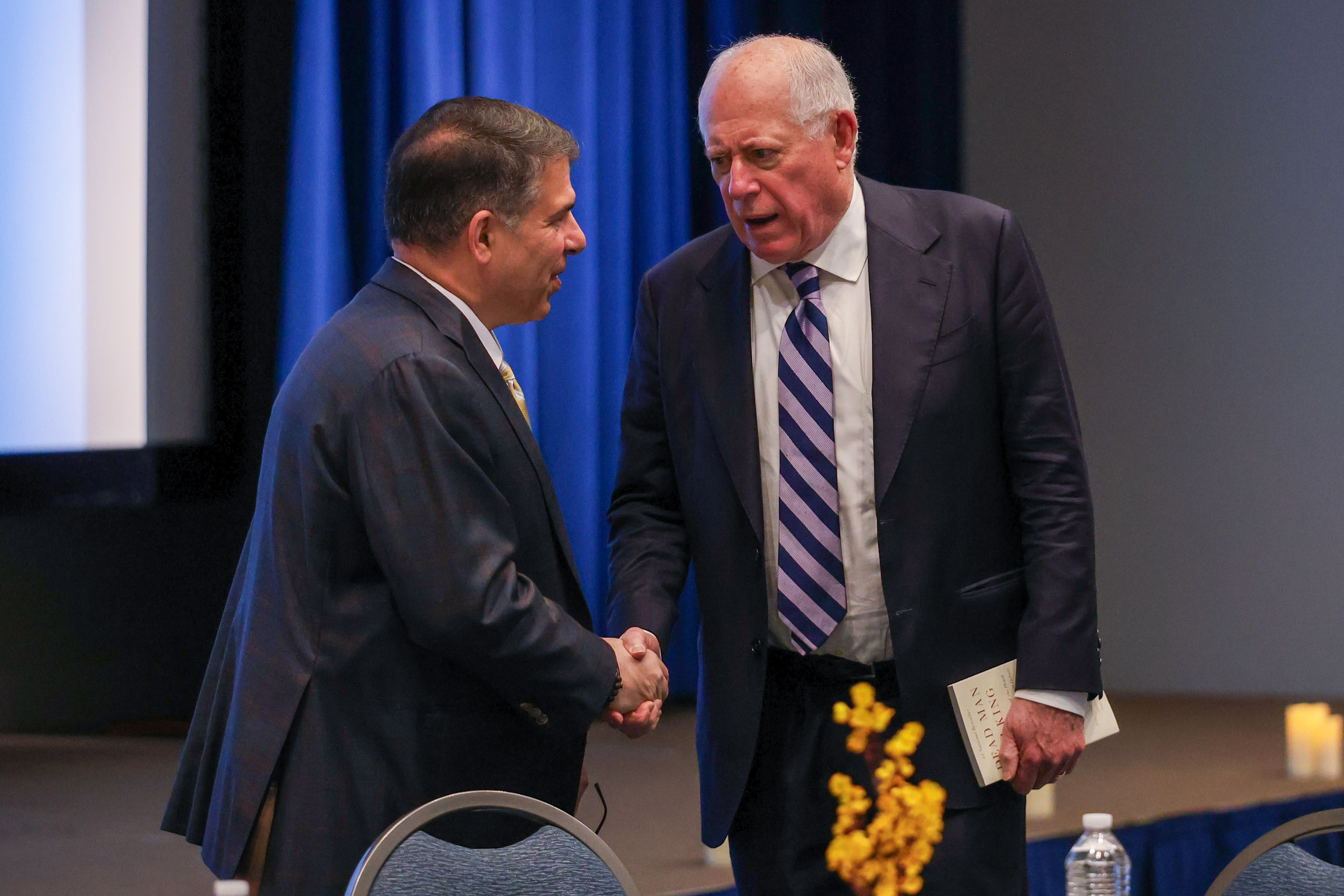 DePaul President Robert L. Manuel (left) meets former Illinois Governor Pat Quinn before "A Beacon of Light in Darkness," on Friday, April 24, 2026.