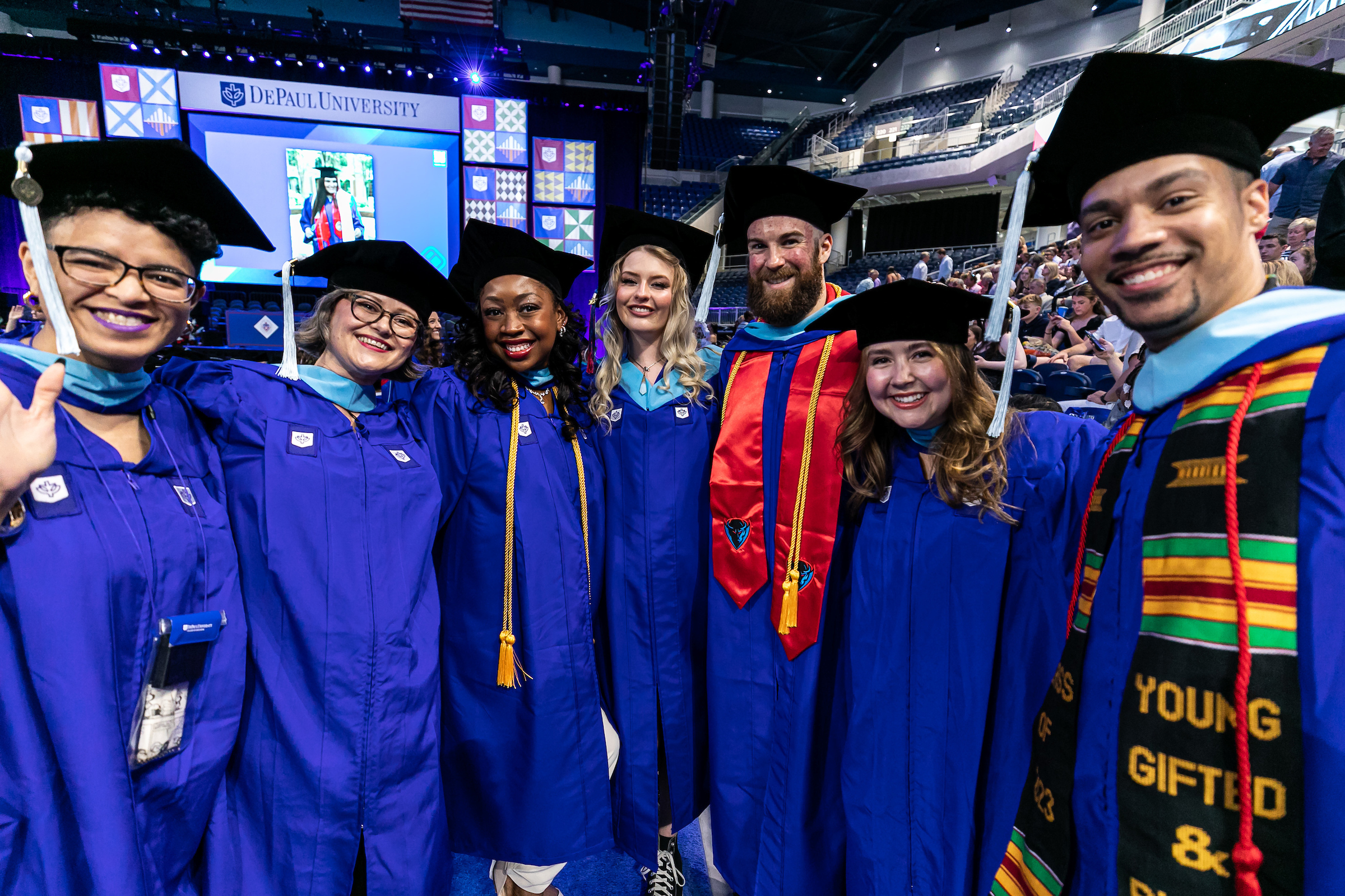A group of graduates at a DePaul University graduation in 2023.