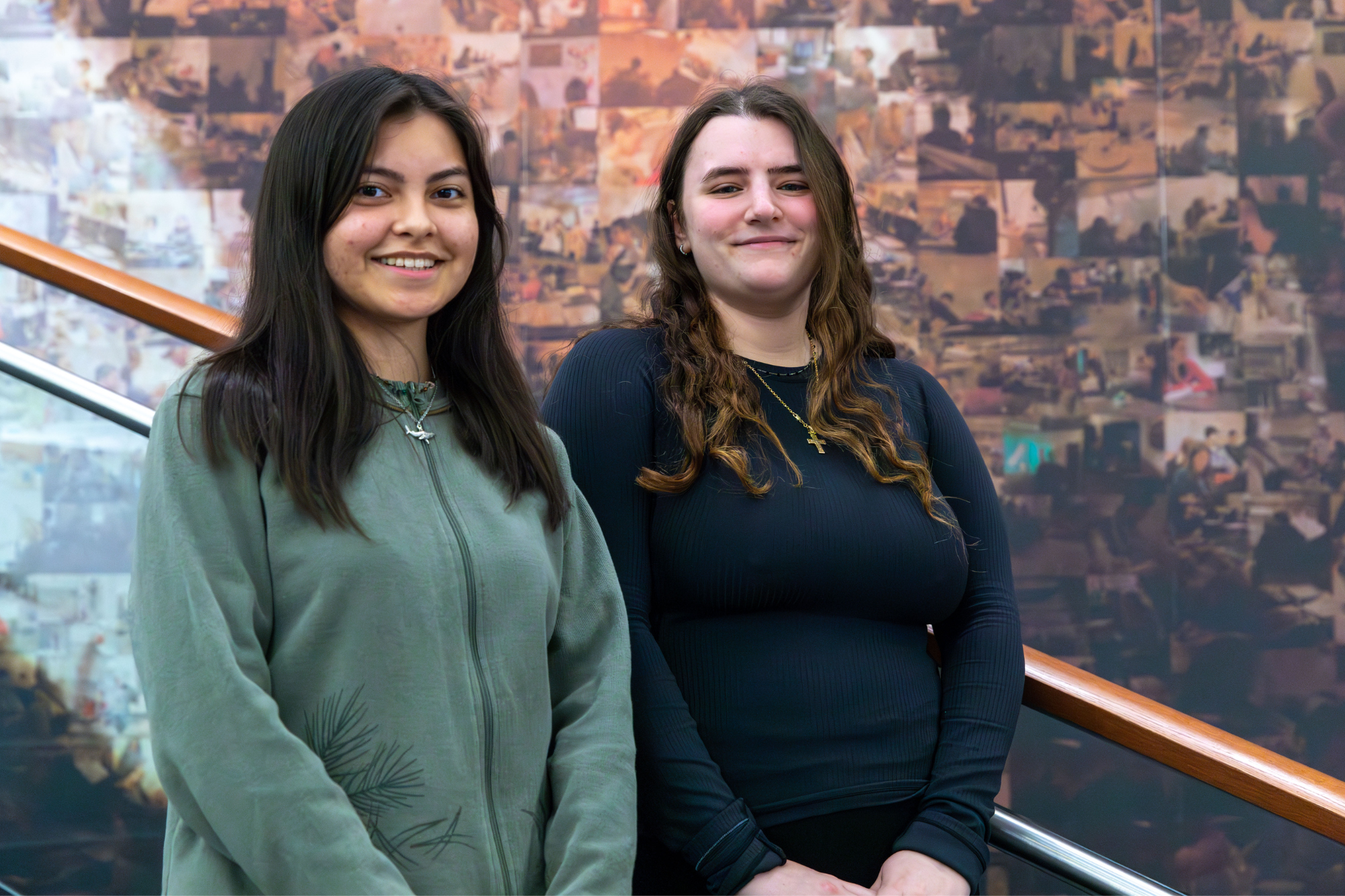 Two students pose for a photo