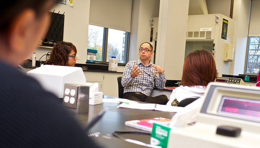 Professor speaking to his class.