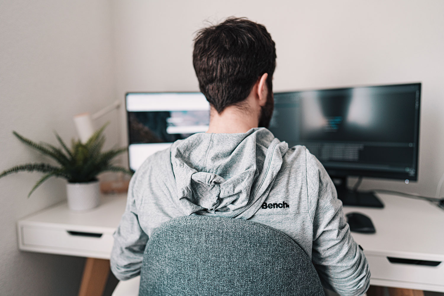 Stock image of a man working at his desk