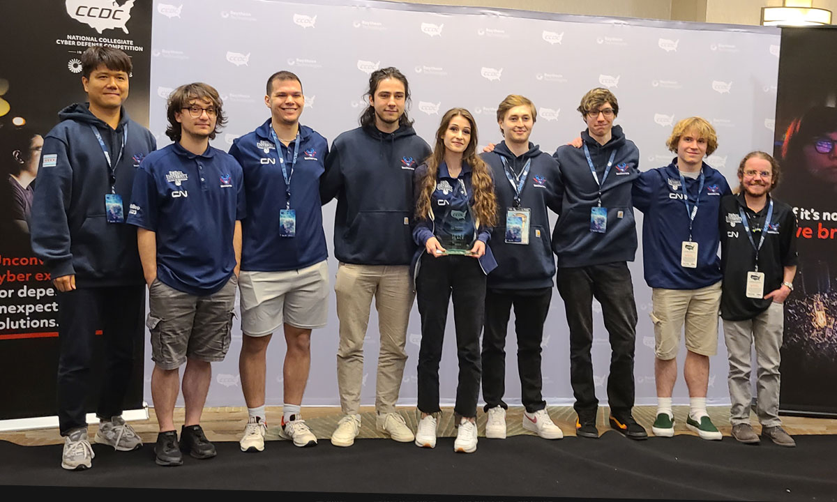 team posing for a pic