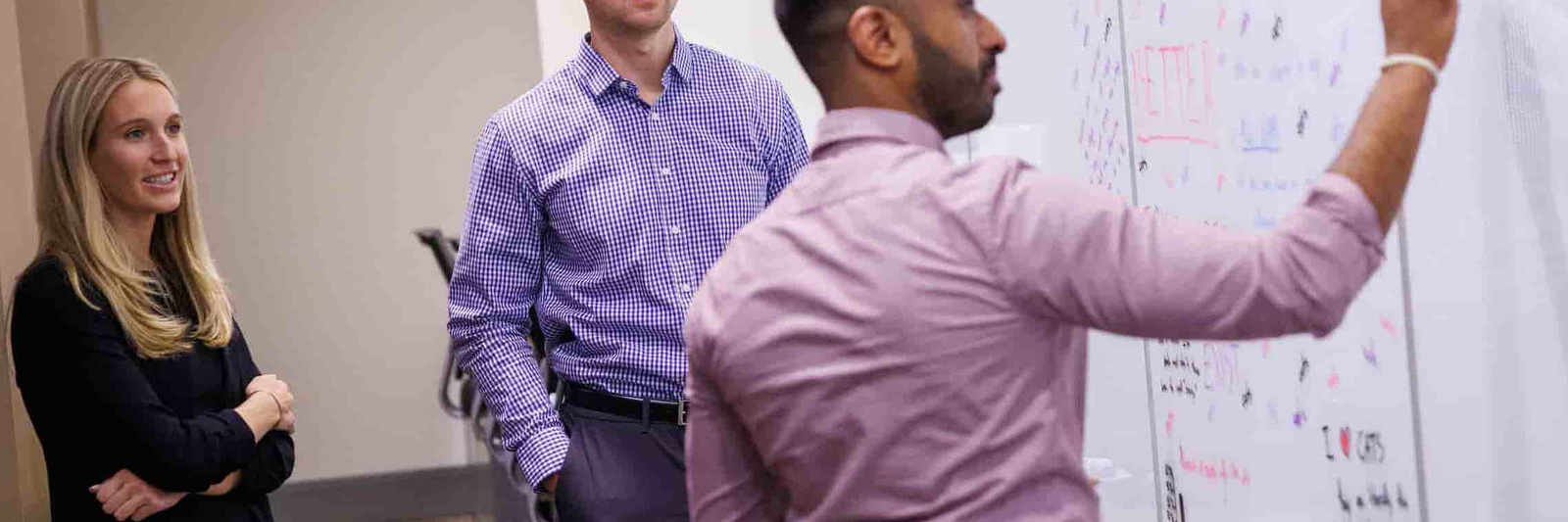 Students in a group talking to each other