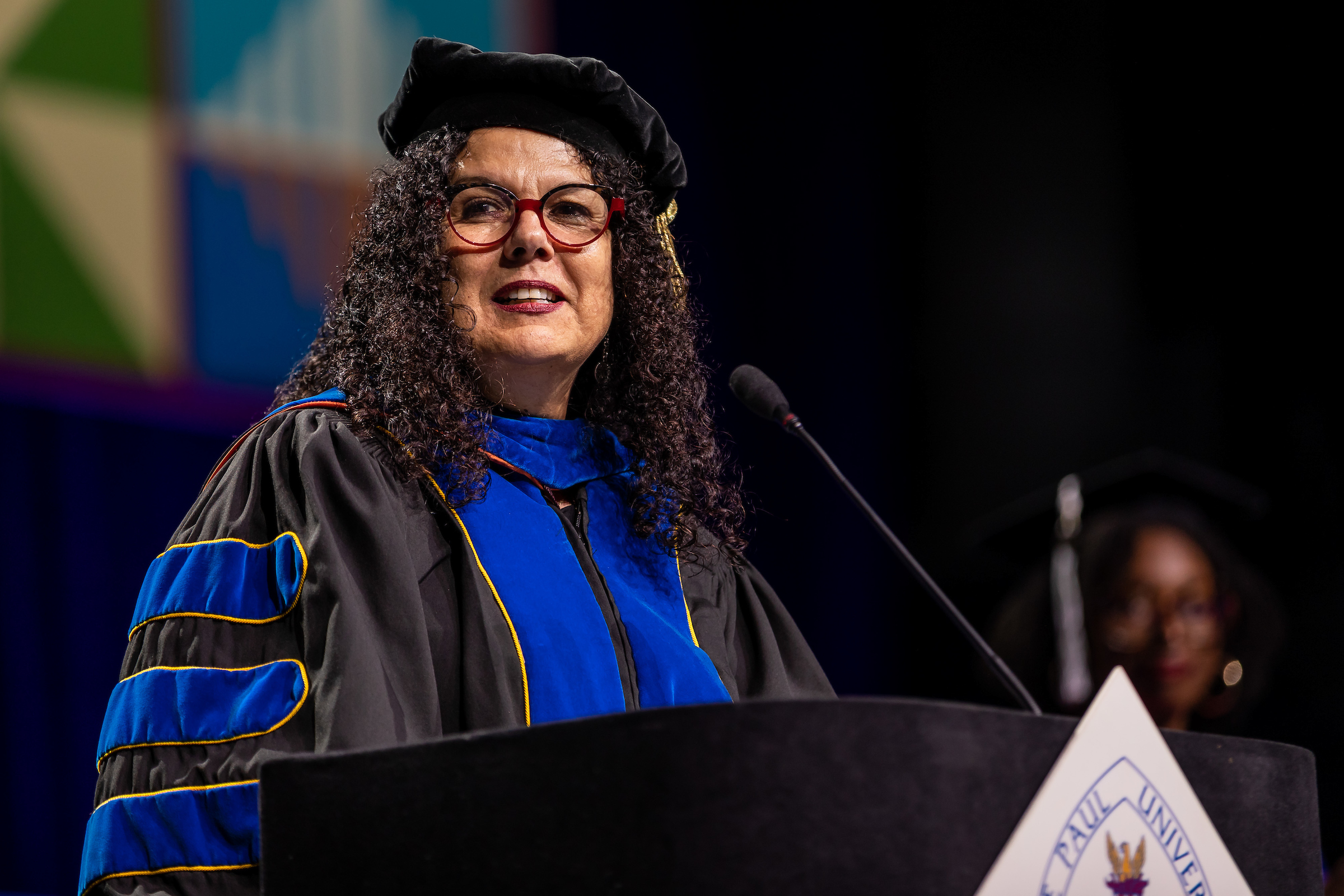 Provost Salma Ghanem addressing graduates at DePaul commencement.