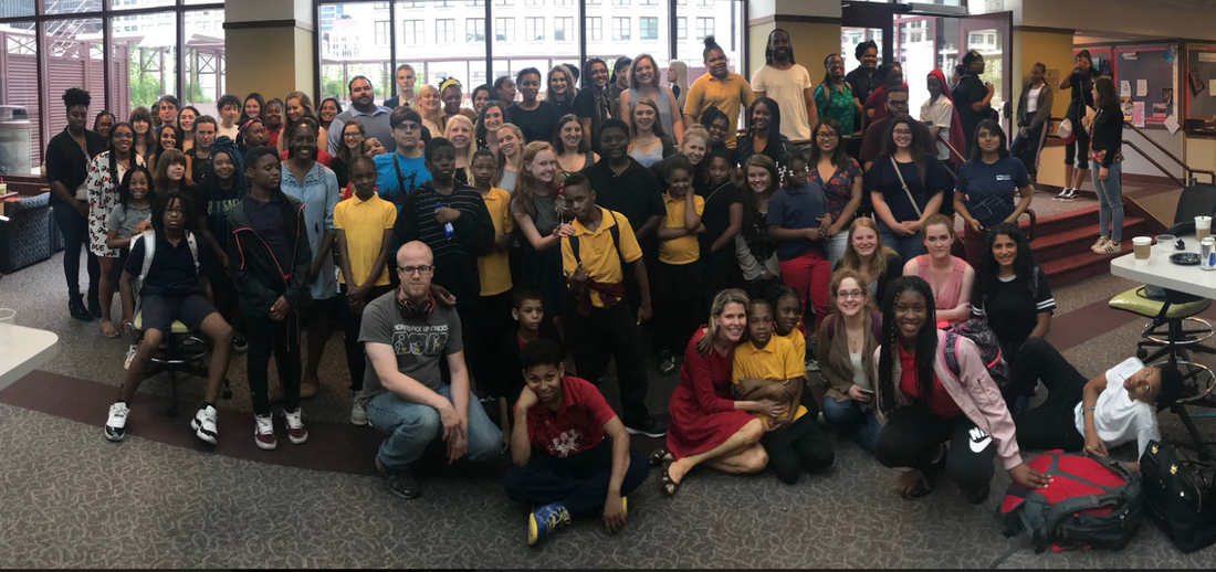 A group of children and mentors.