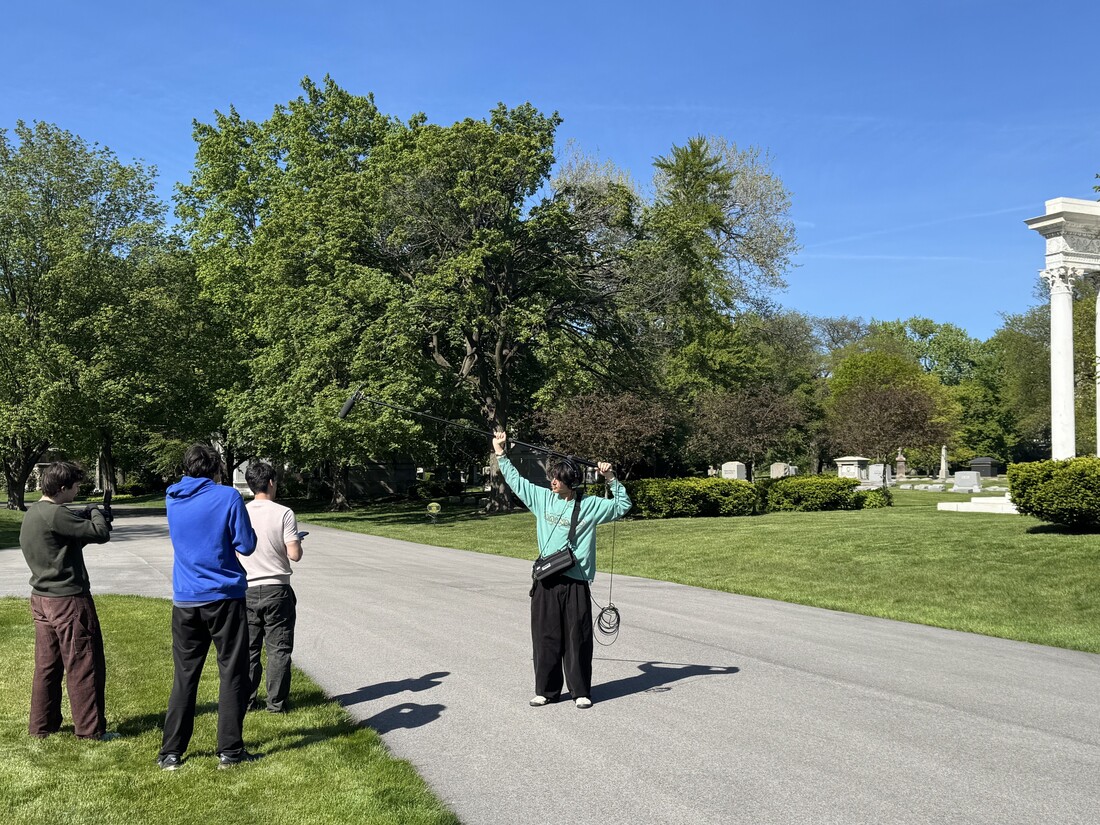 Student team films a scene for their game at Graceland