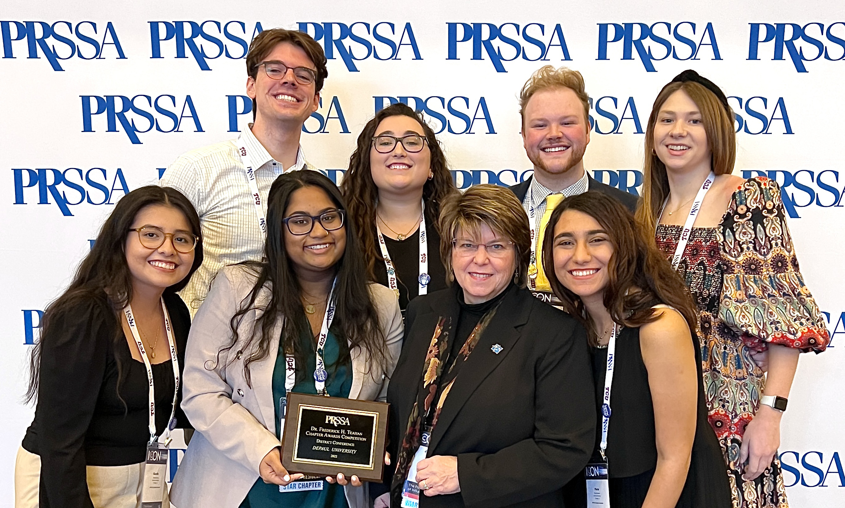 DePaul PRSSA chapter members pose with award
