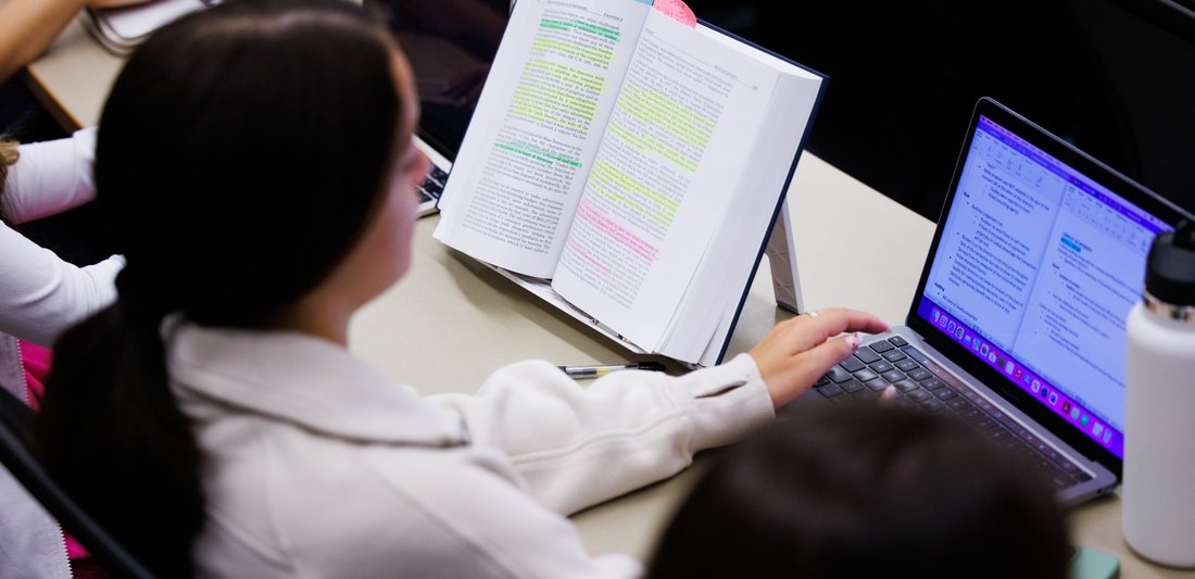Law Student On Laptop From Behind 