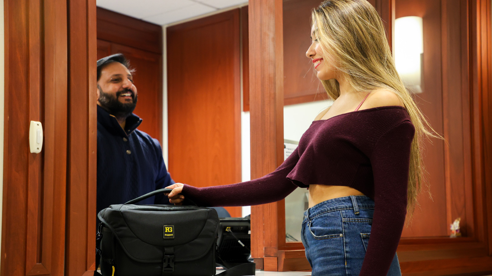 Student Checking in Equipment at the College of Communication Equipment Center