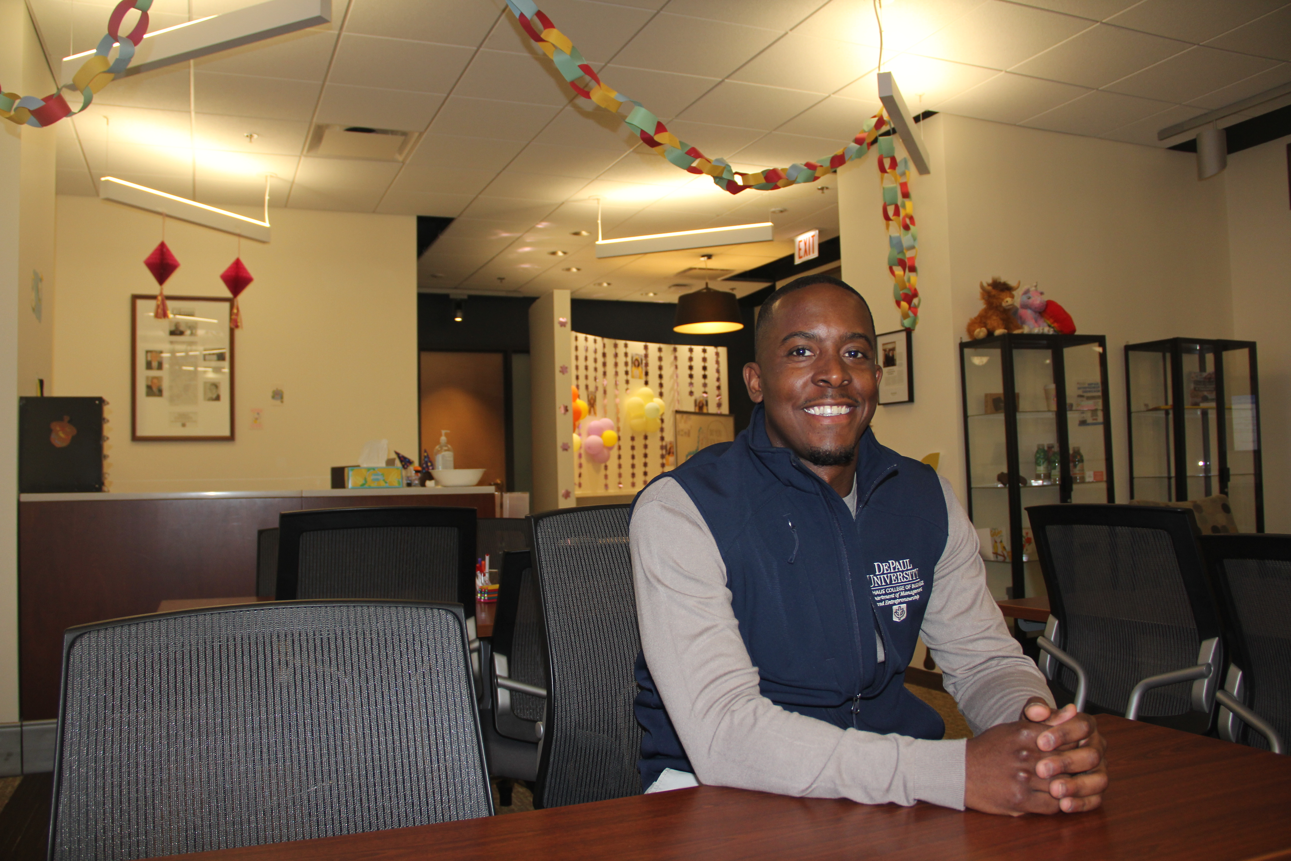 Lonnie Baylor Jr. sitting in the Coleman Entrepreneurship Center