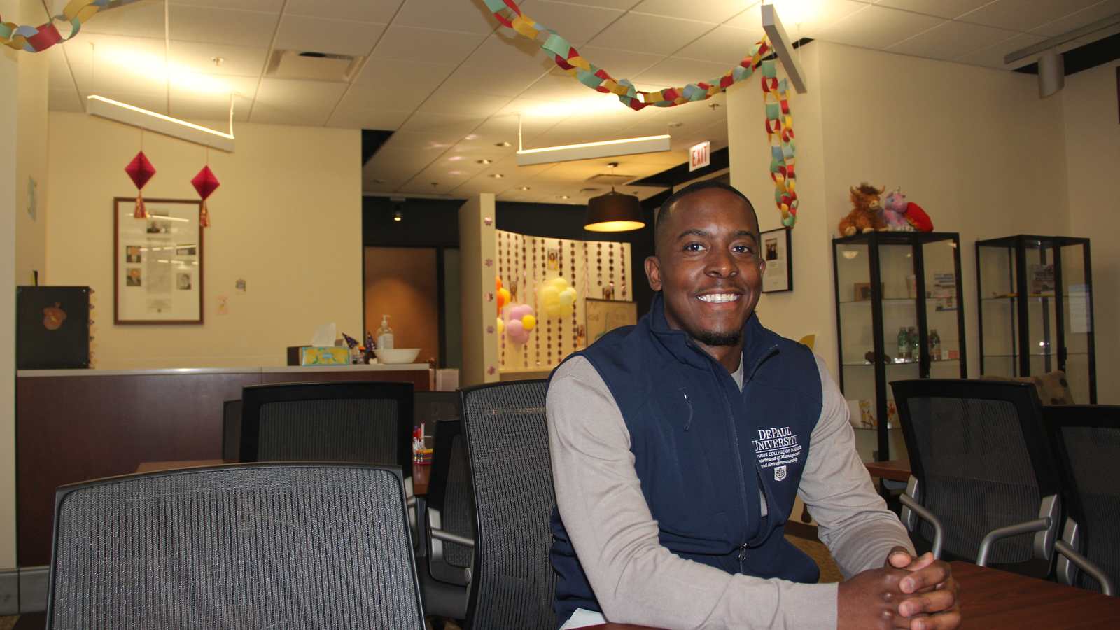Lonnie Baylor Jr. sitting in the Coleman Entrepreneurship Center