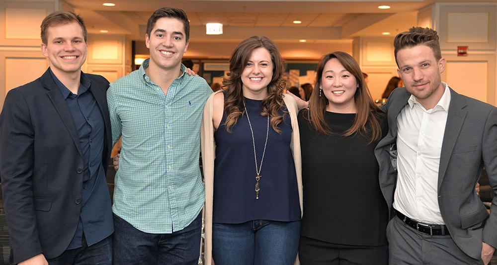 Alumni at a marketing event