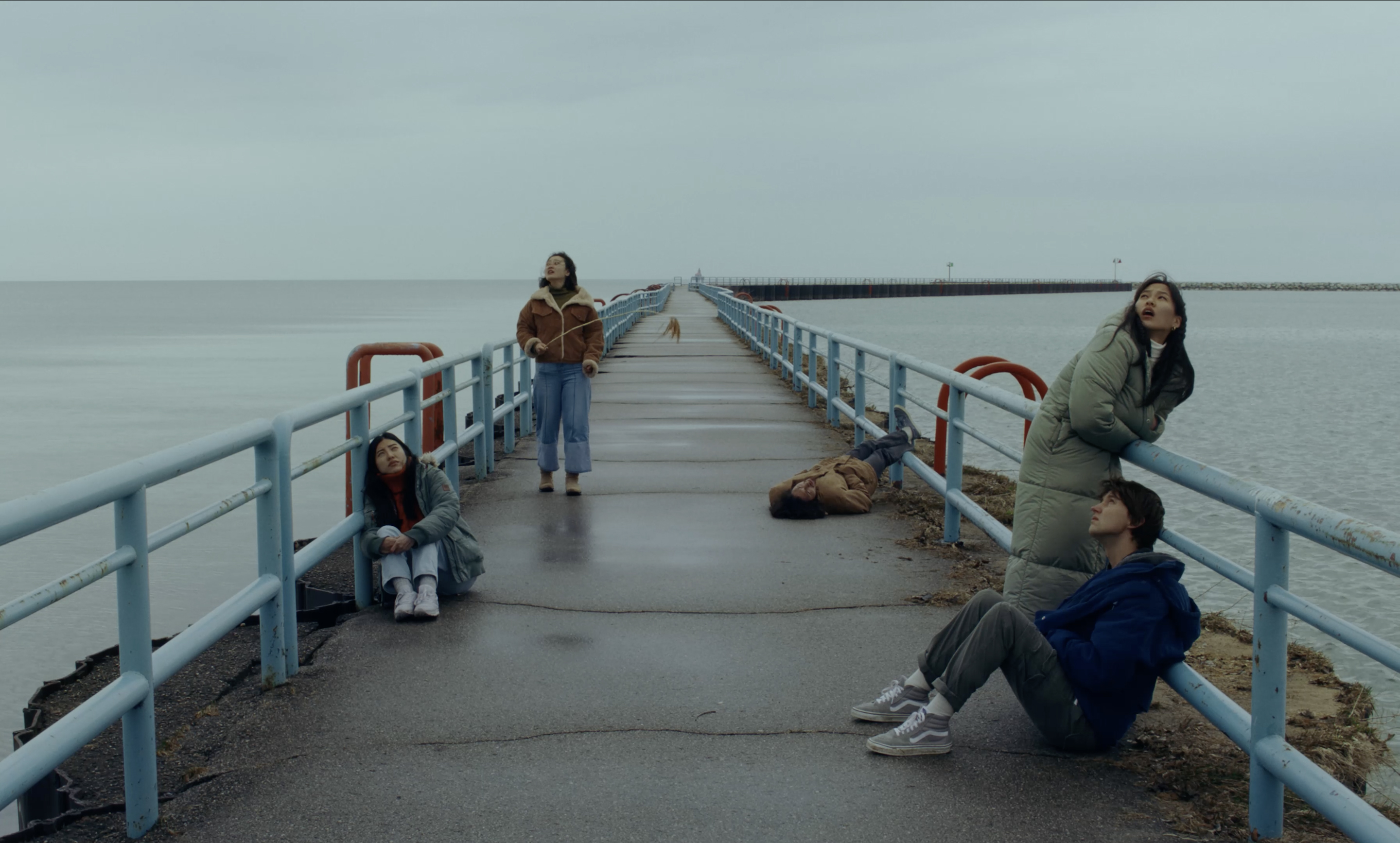 Young adults on a Michigan pier, a still from the film