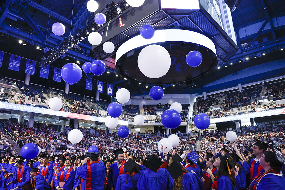 Commencement ceremony with balloons falling