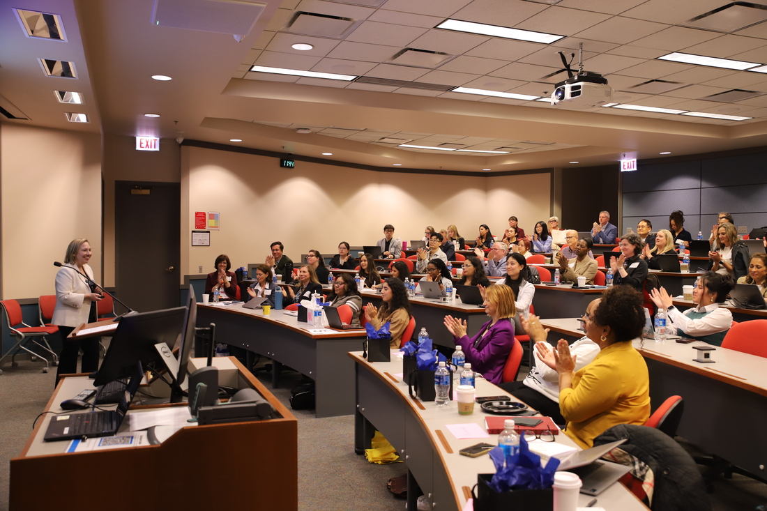 Sarah Reinecke addressing audience at the 2026 AEF Conference at DePaul University