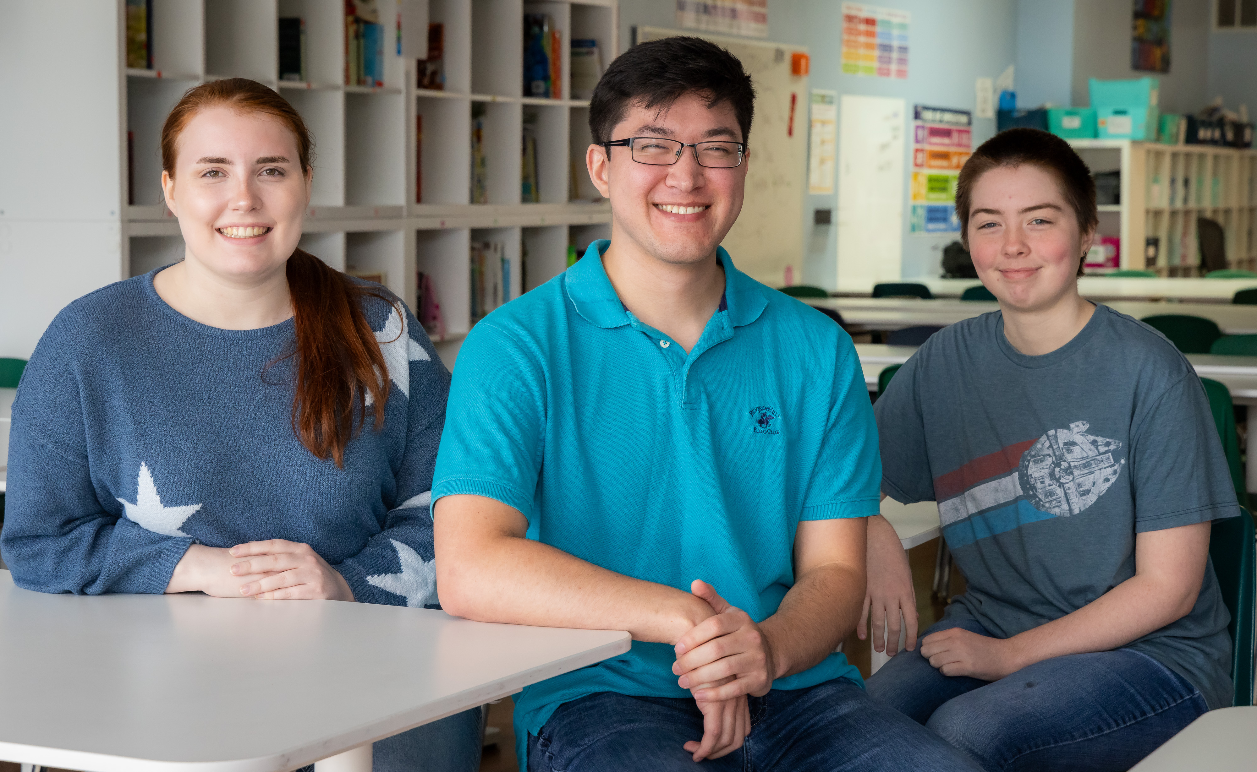 DePaul College of Communication students, left to right, Natalie Spang, Tristan Balgemann and Isabelle Robichaud at Forging Opportunities for Refugees in America (FORA) for their nonprofit communication course.