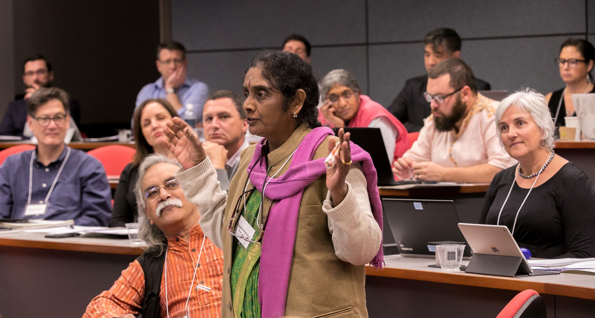 Woman presents at conference