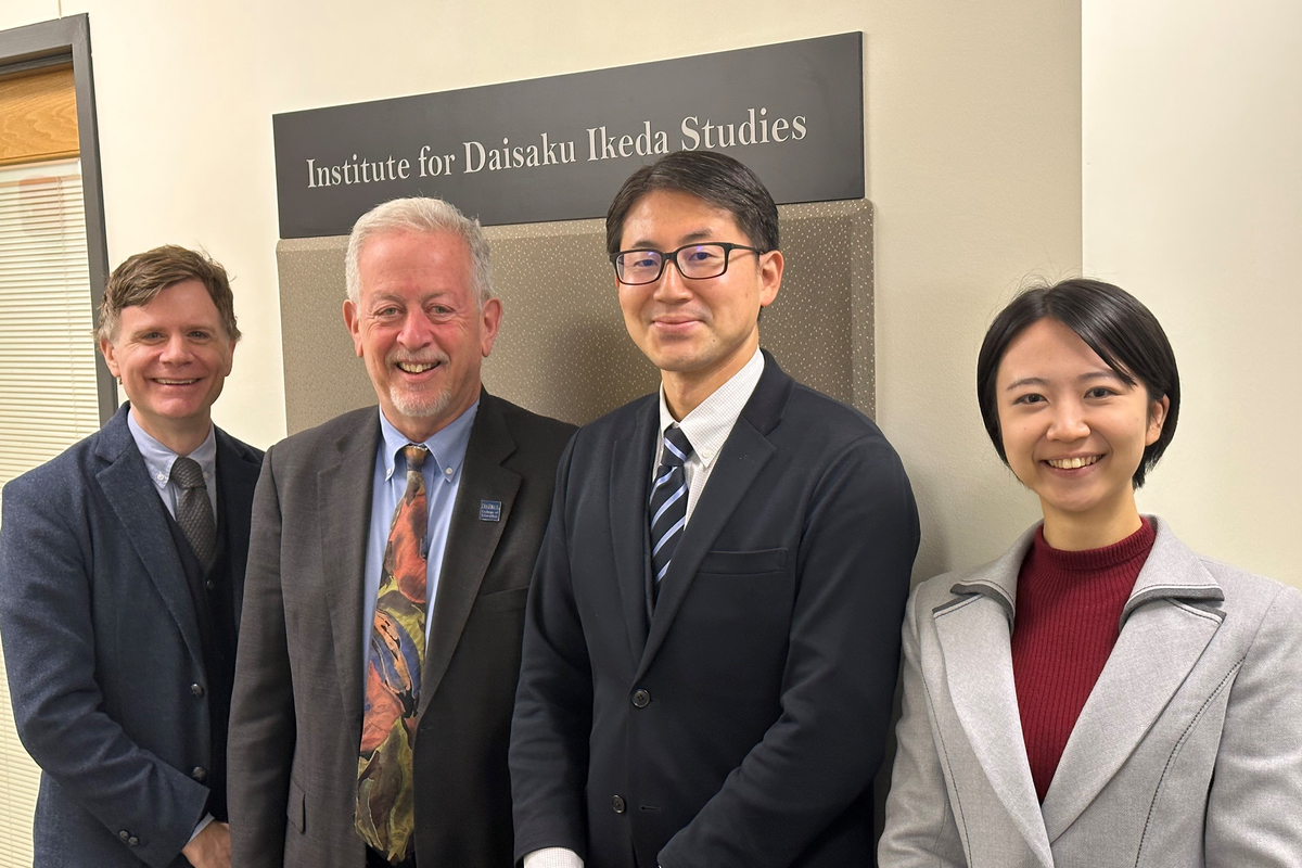 Jason Goulah and Paul Zionts stand with Mitsuaki Asano and Masami Shigeno