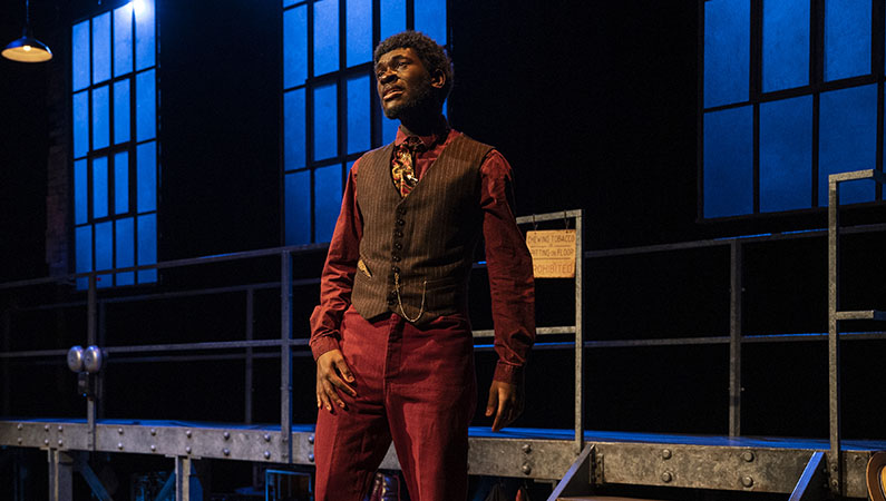 actor on stage at theatre school