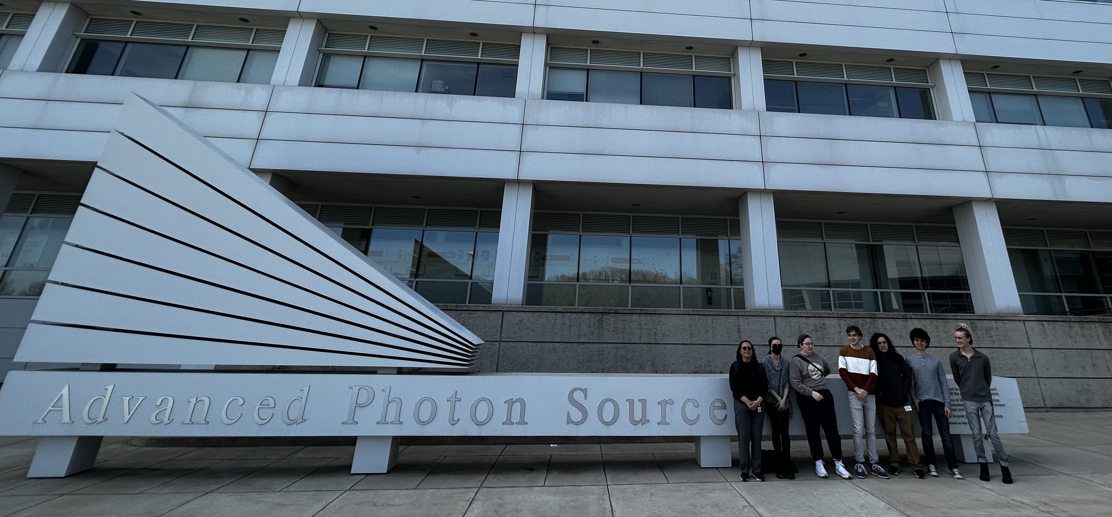 People in front of a laboratory